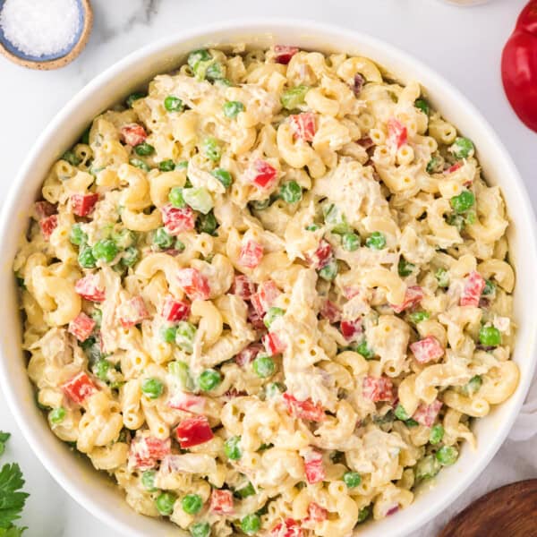 Overhead view of chicken macaroni salad in a large bowl.