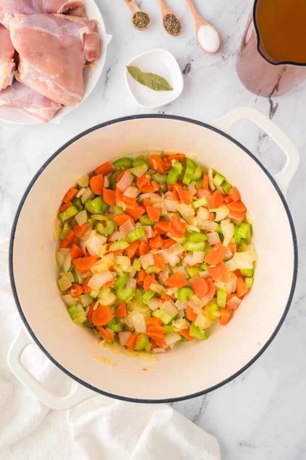 Sauteed veggies in a large pot.