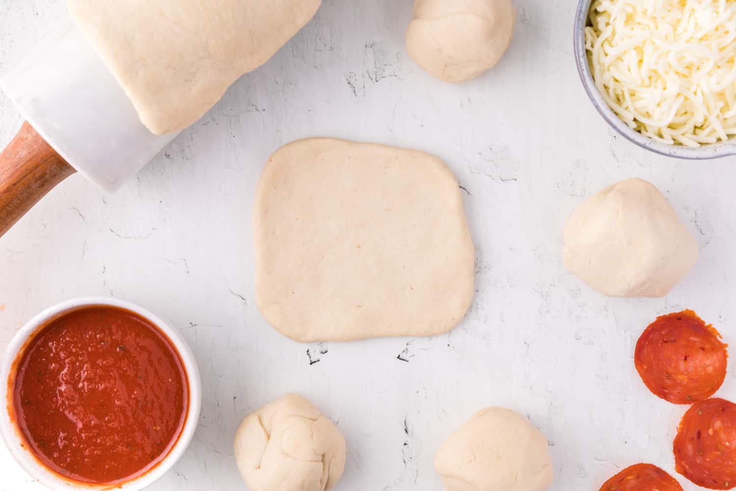 Dough rolled into a small circle.