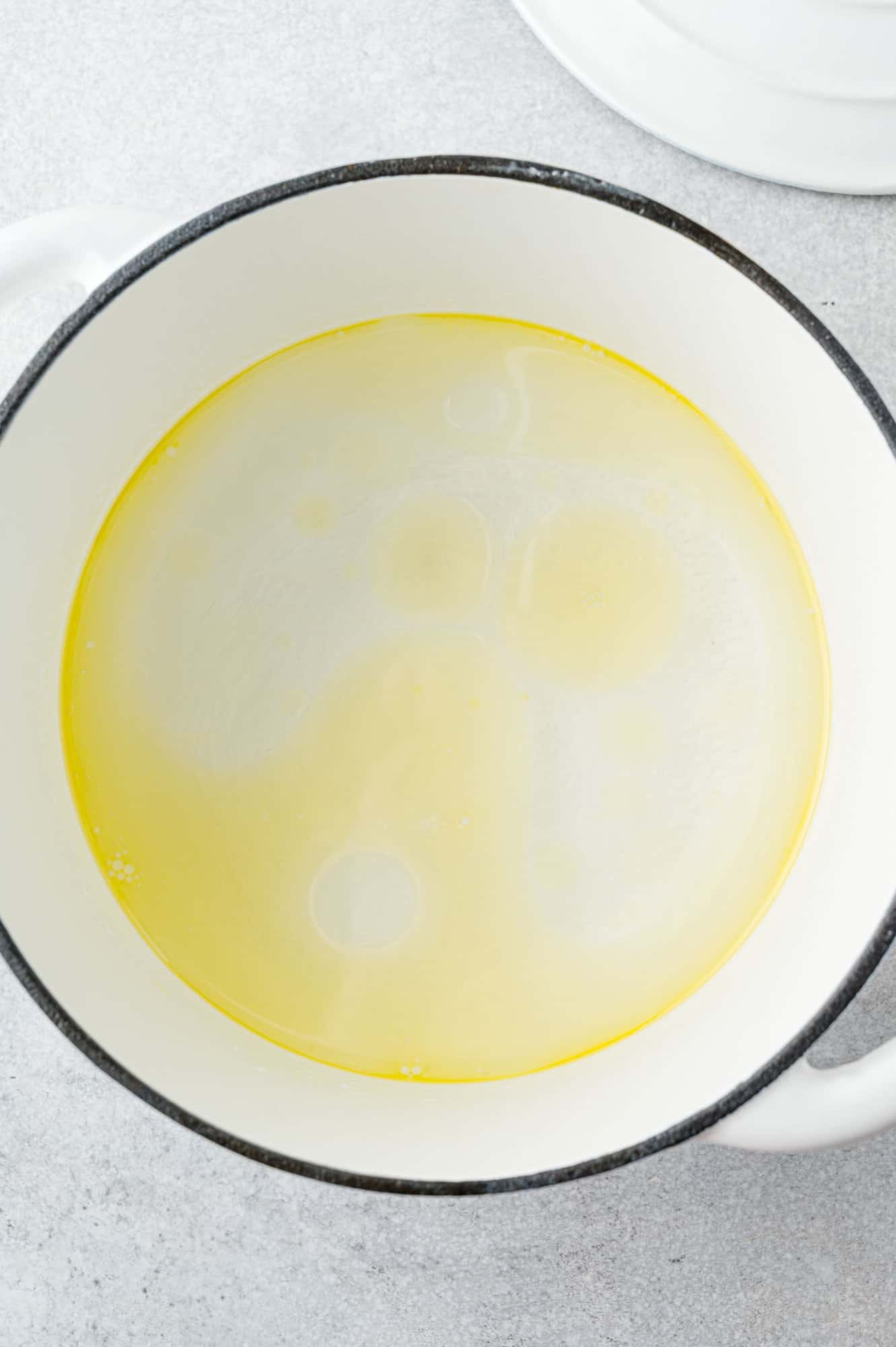 Oil and water in a large pan.