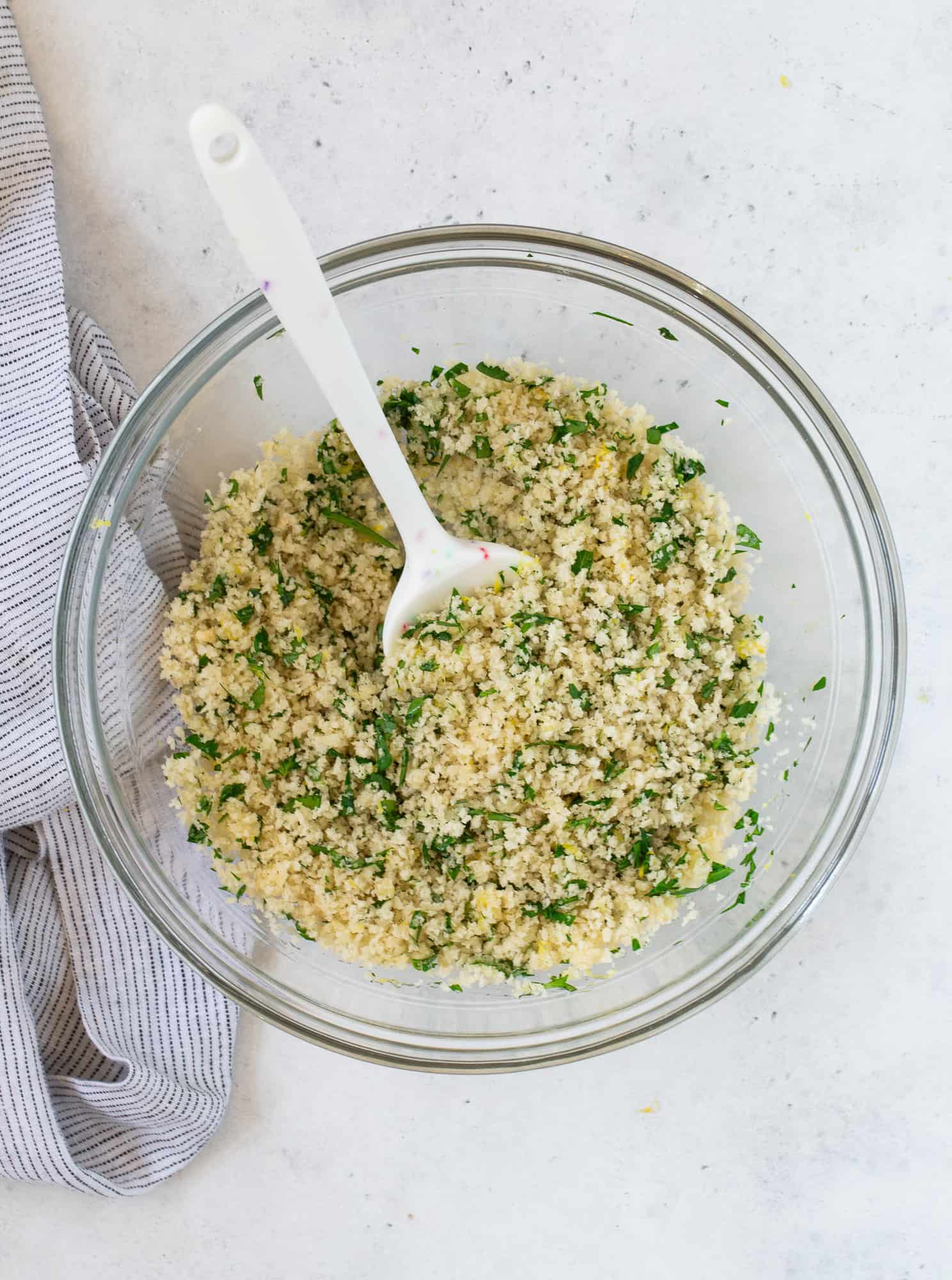 Ingredients needed for breadcrumb topping, mixed together.