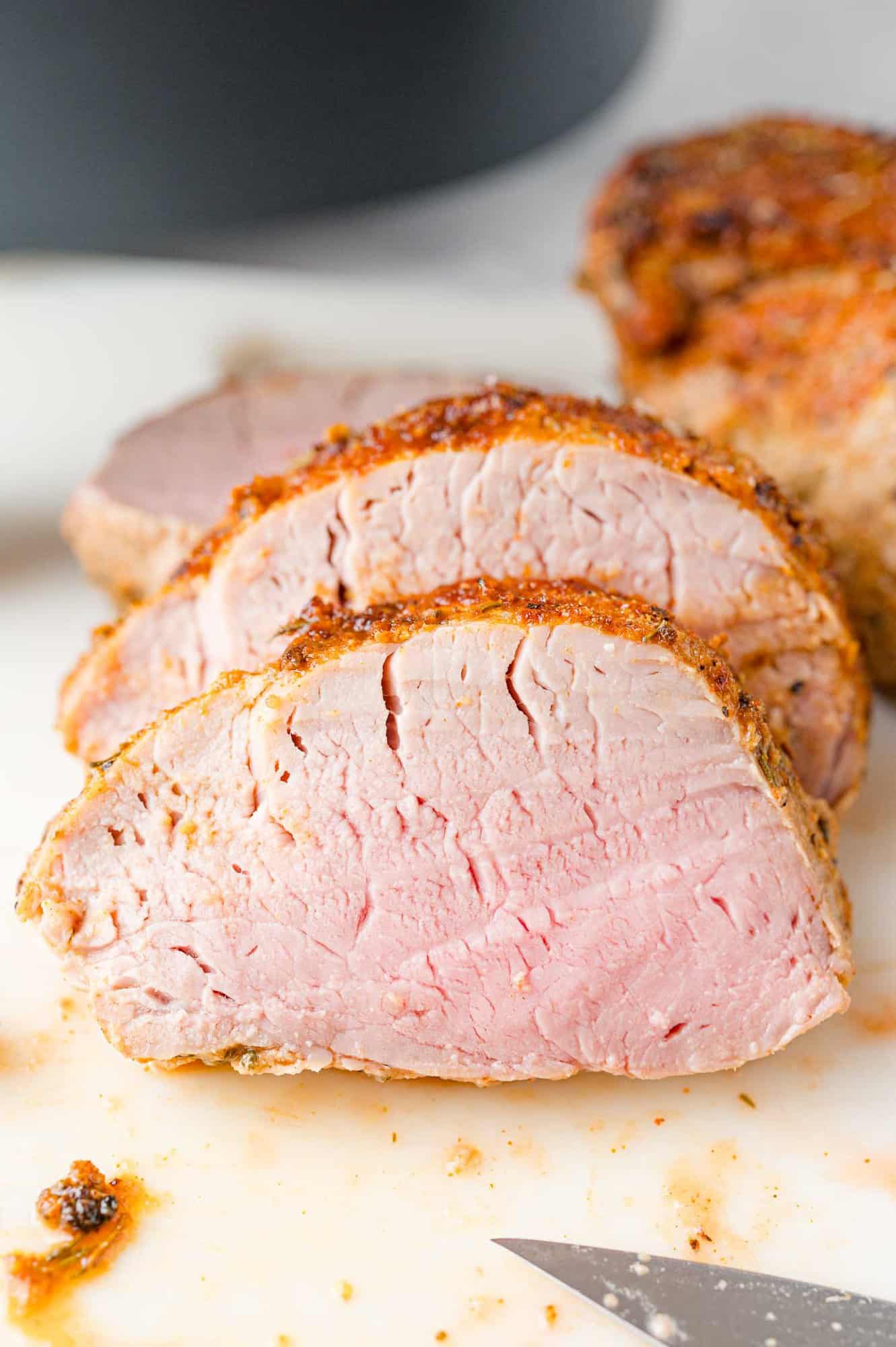 Sliced air fryer pork tenderloin.