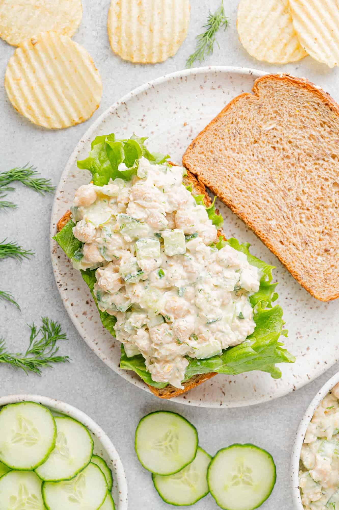 Overhead view of open faced chickpea salad sandwich.