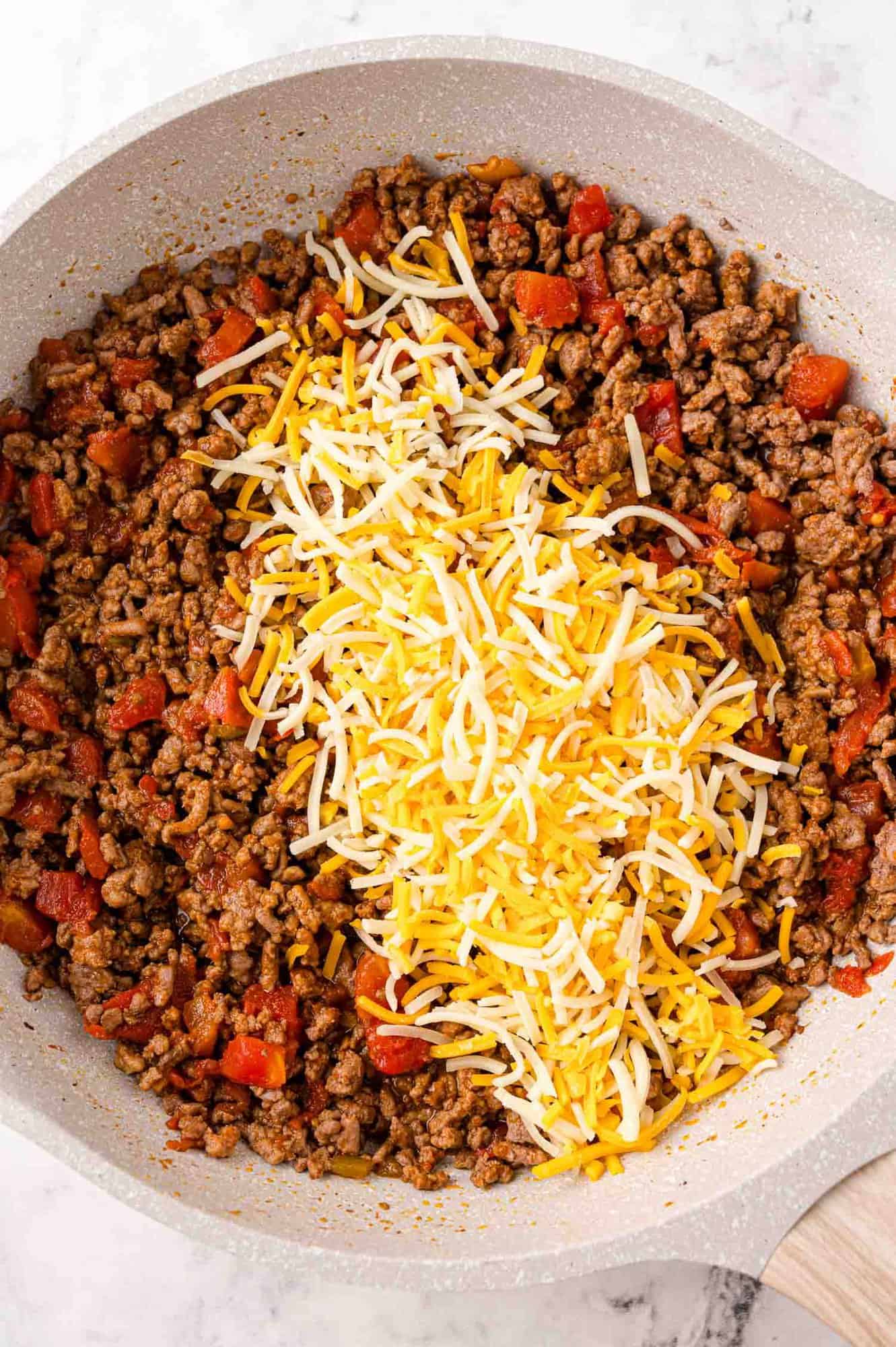 Cheese added to meat mixture.