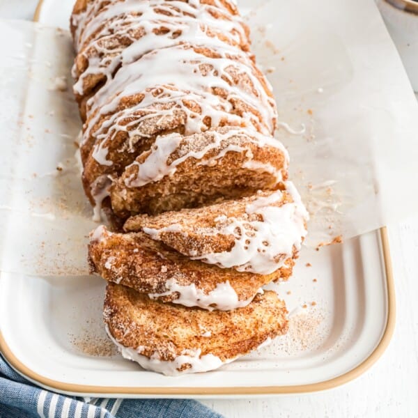 Cinnamon sugar pull apart bread, partially pulled apart to show layers.
