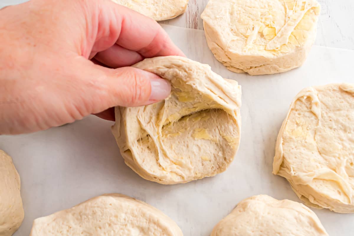 Biscuit layers being pulled apart.