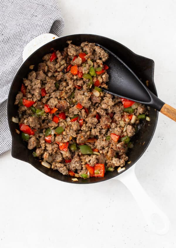 Sausage and vegetables after browning.