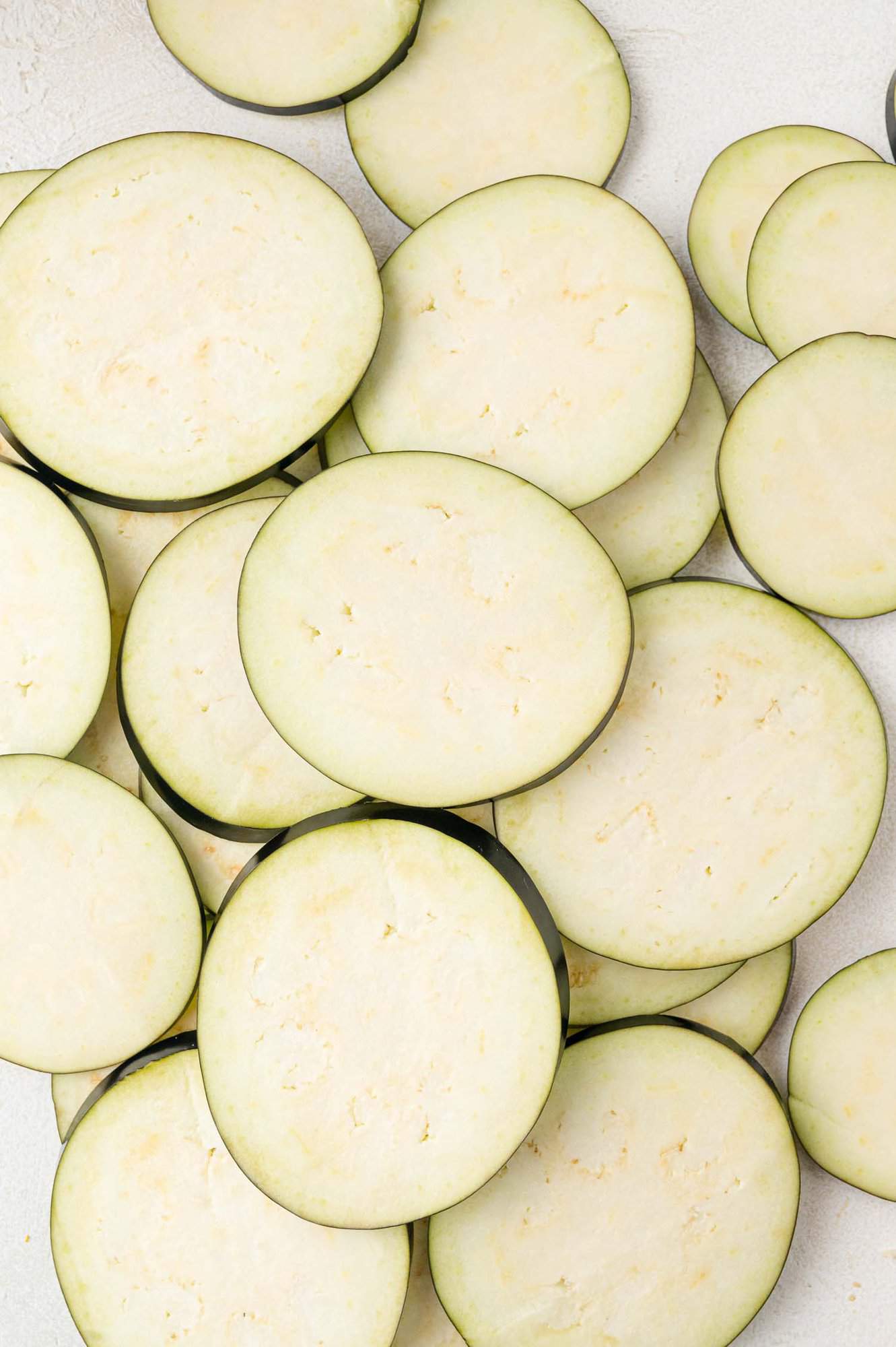 Sliced raw eggplant.