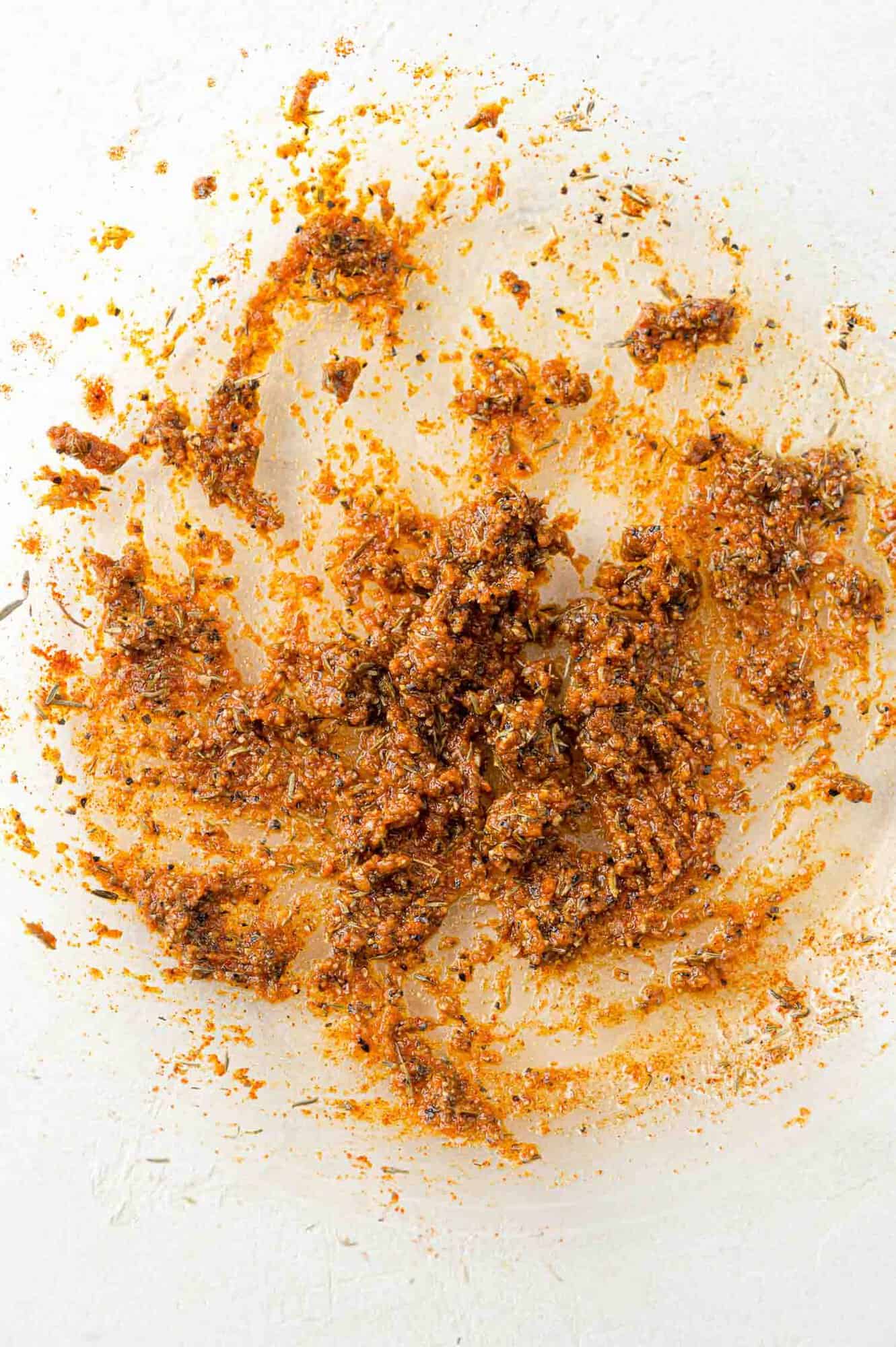 Steak marinade in a glass bowl.