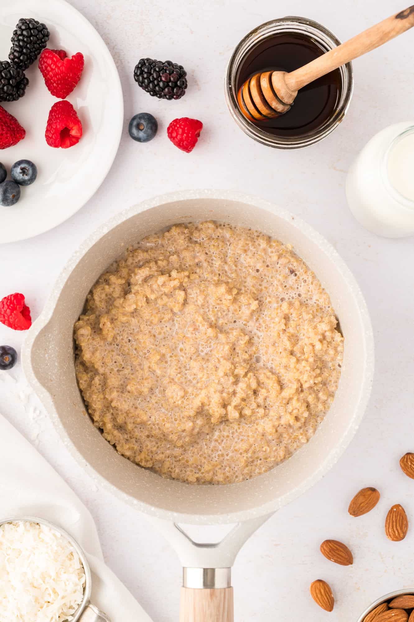Cooked breakfast quinoa in a saucepan.