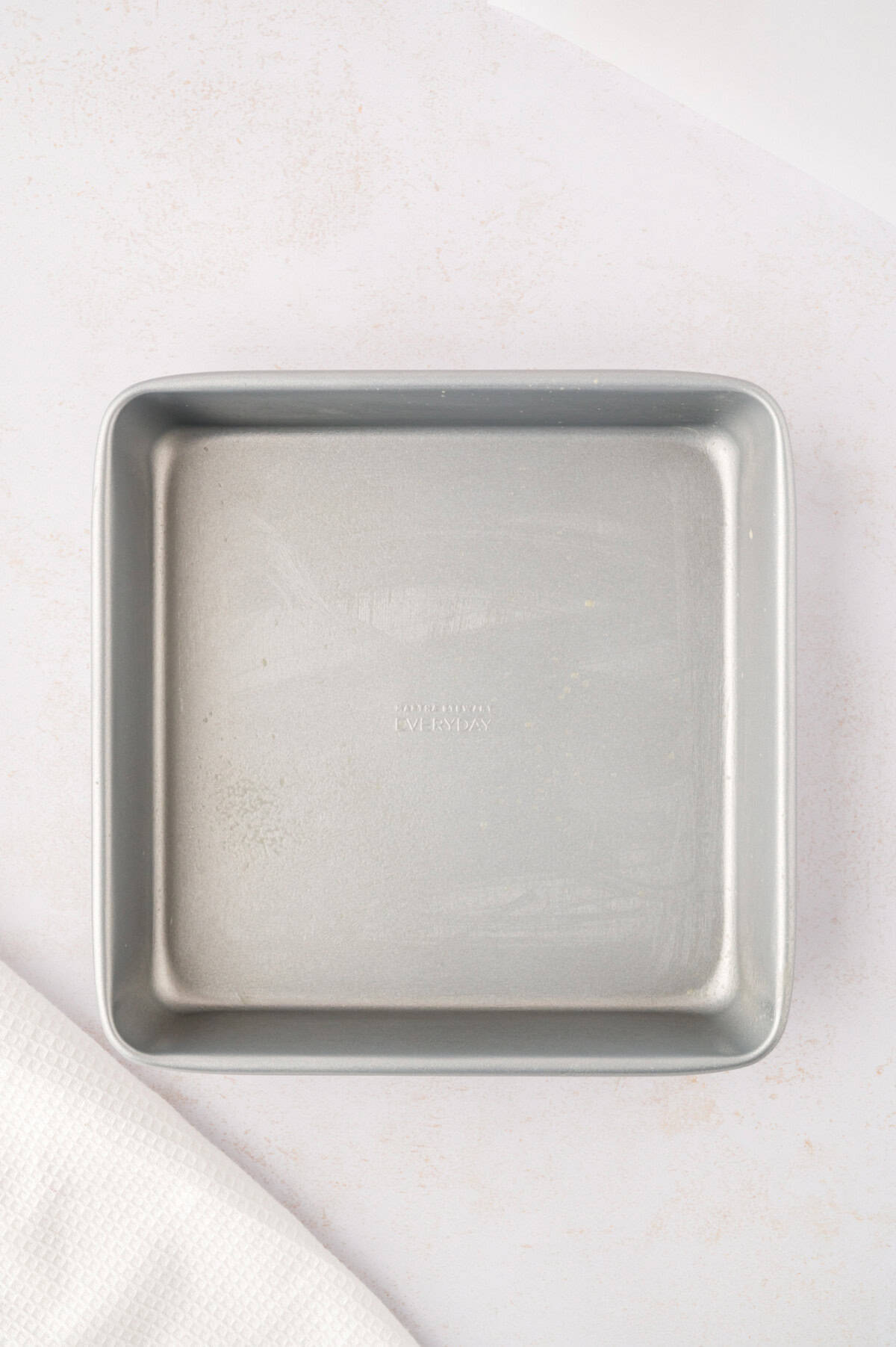 Empty square metal baking dish.