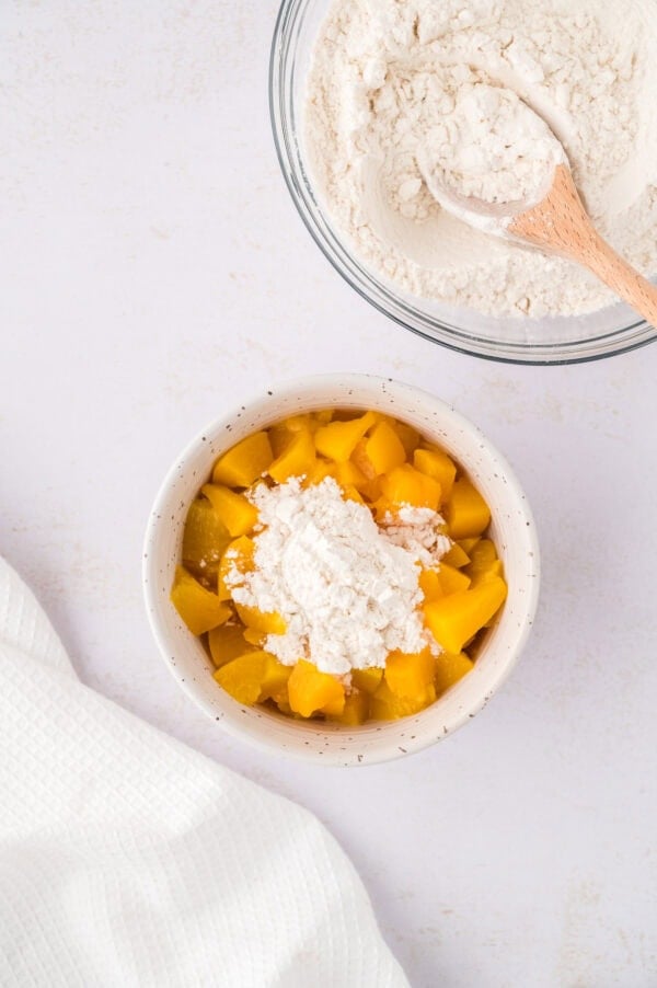 Peaches with flour added on top.