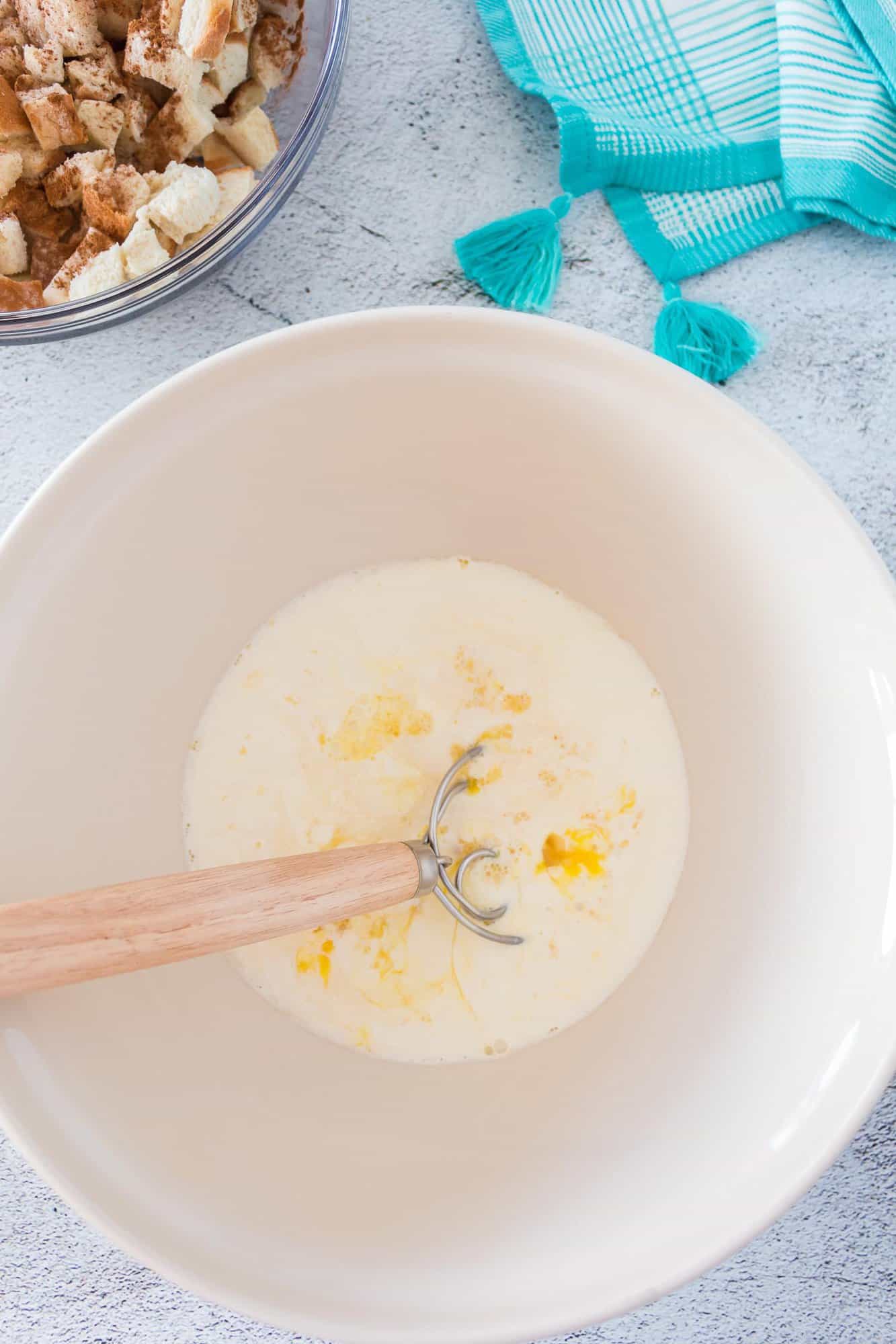 French toast custard mixture being combined.