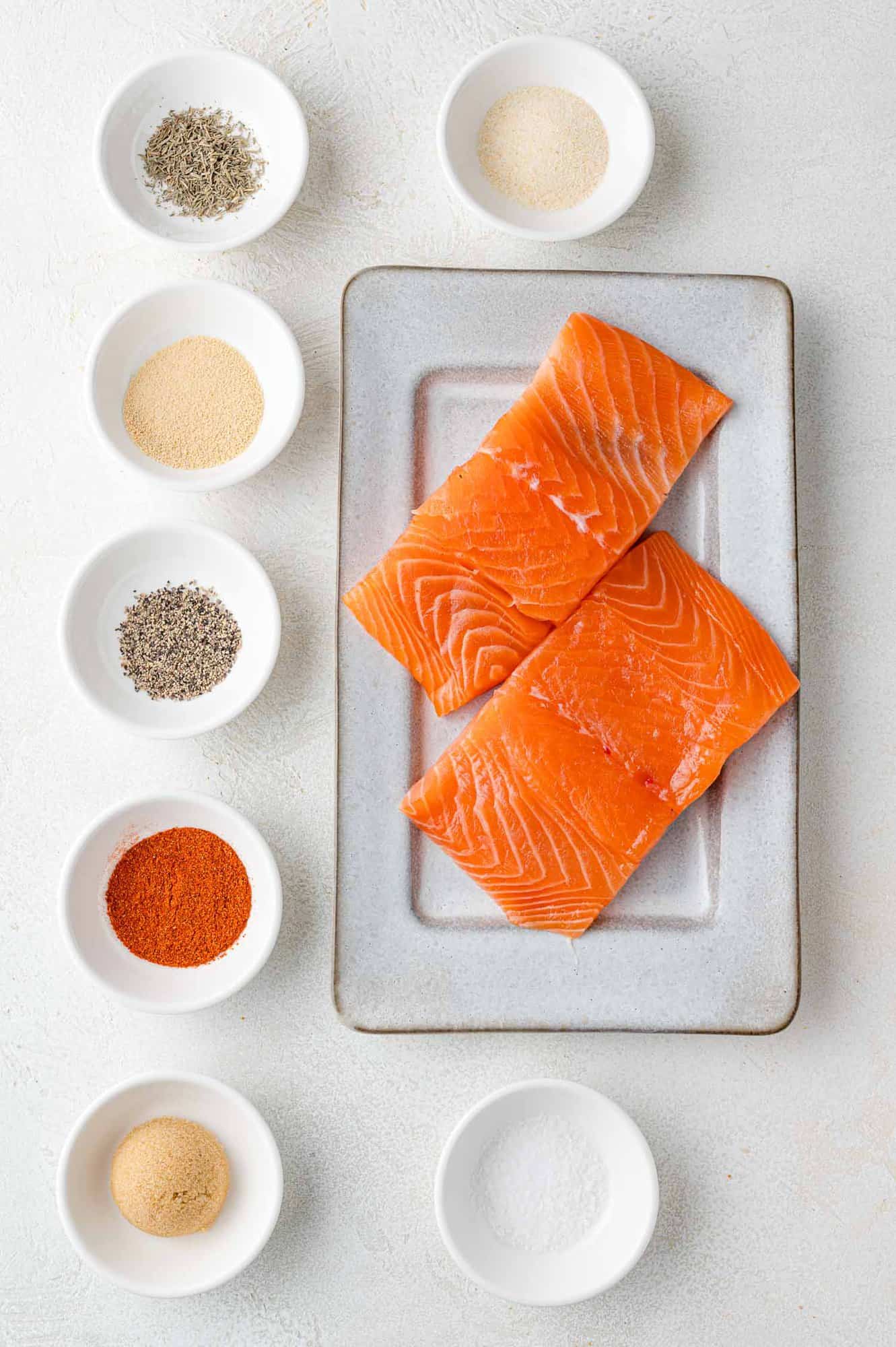 Ingredients needed for salmon bites, including two salmon fillets.