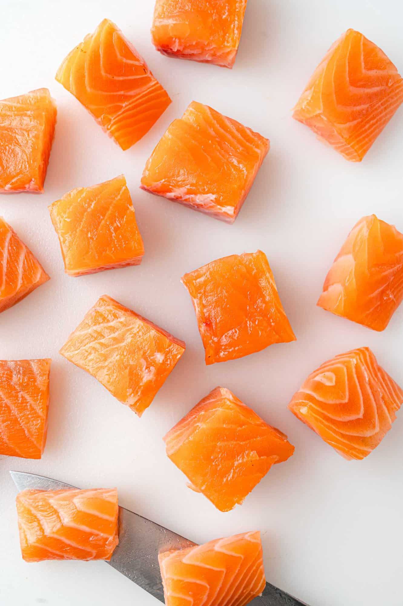 Salmon cut into even sized bites.