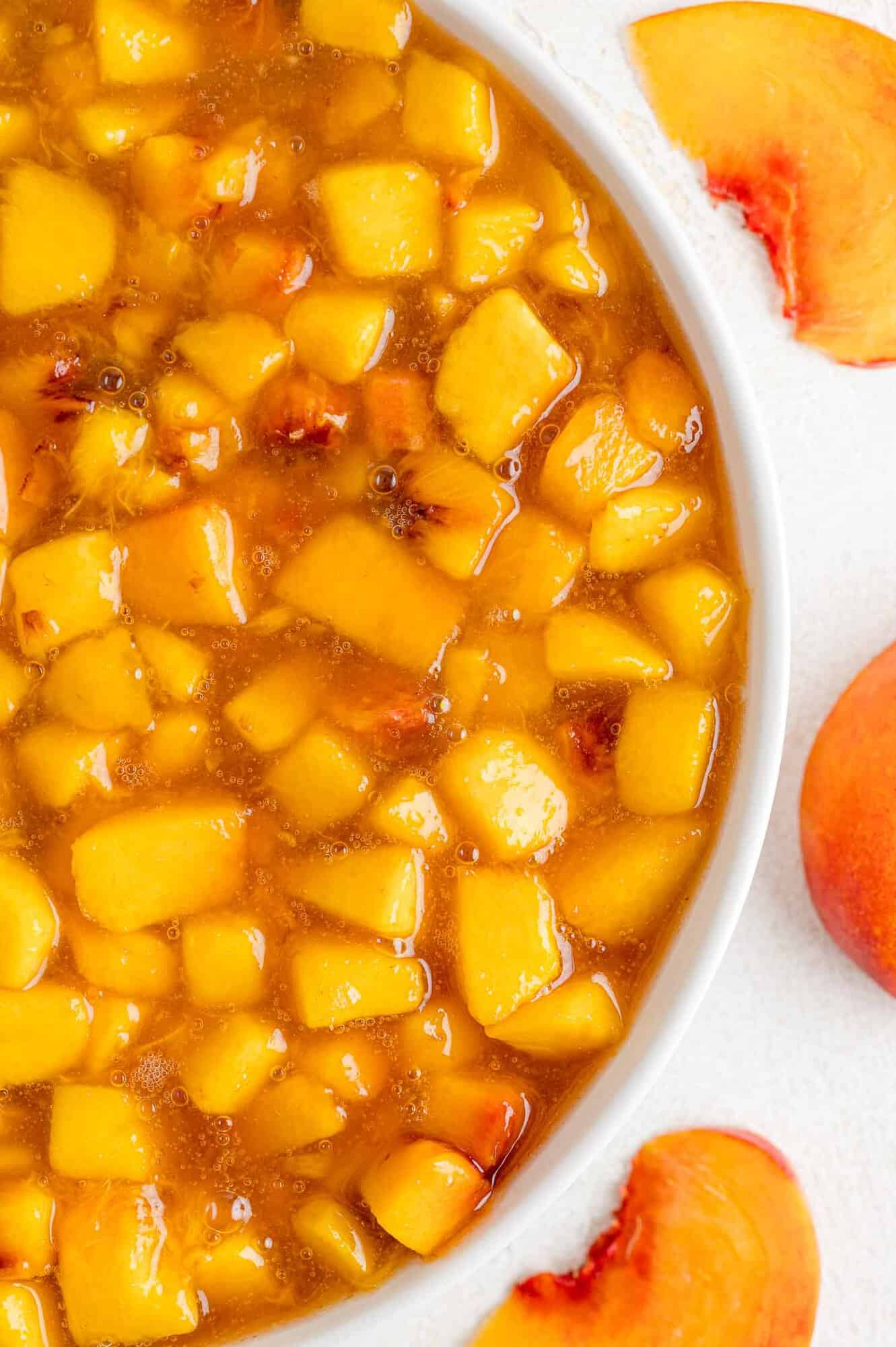 Peach sauce in a large white bowl.