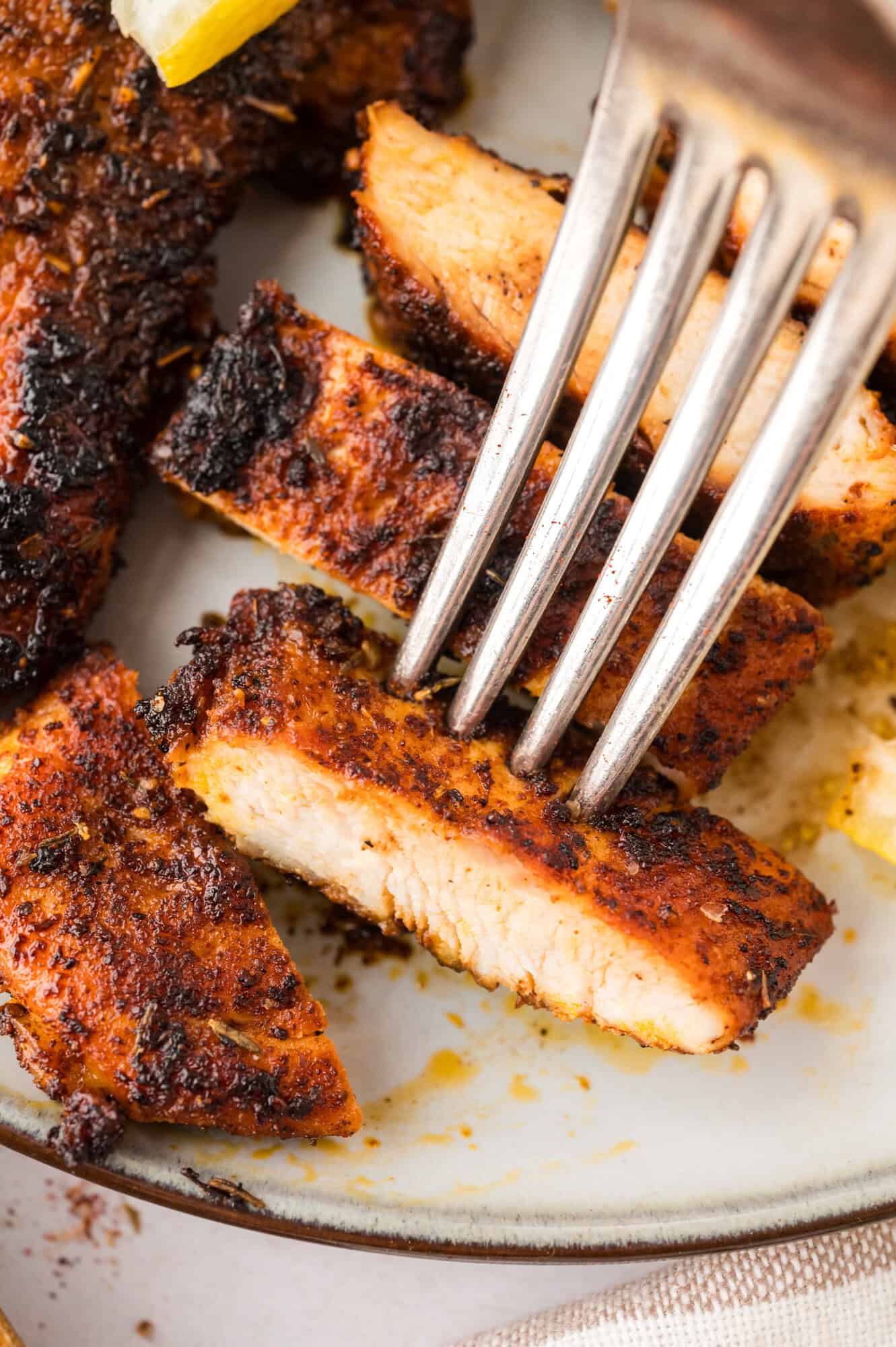 Chicken seasoned with blackening seasoning.