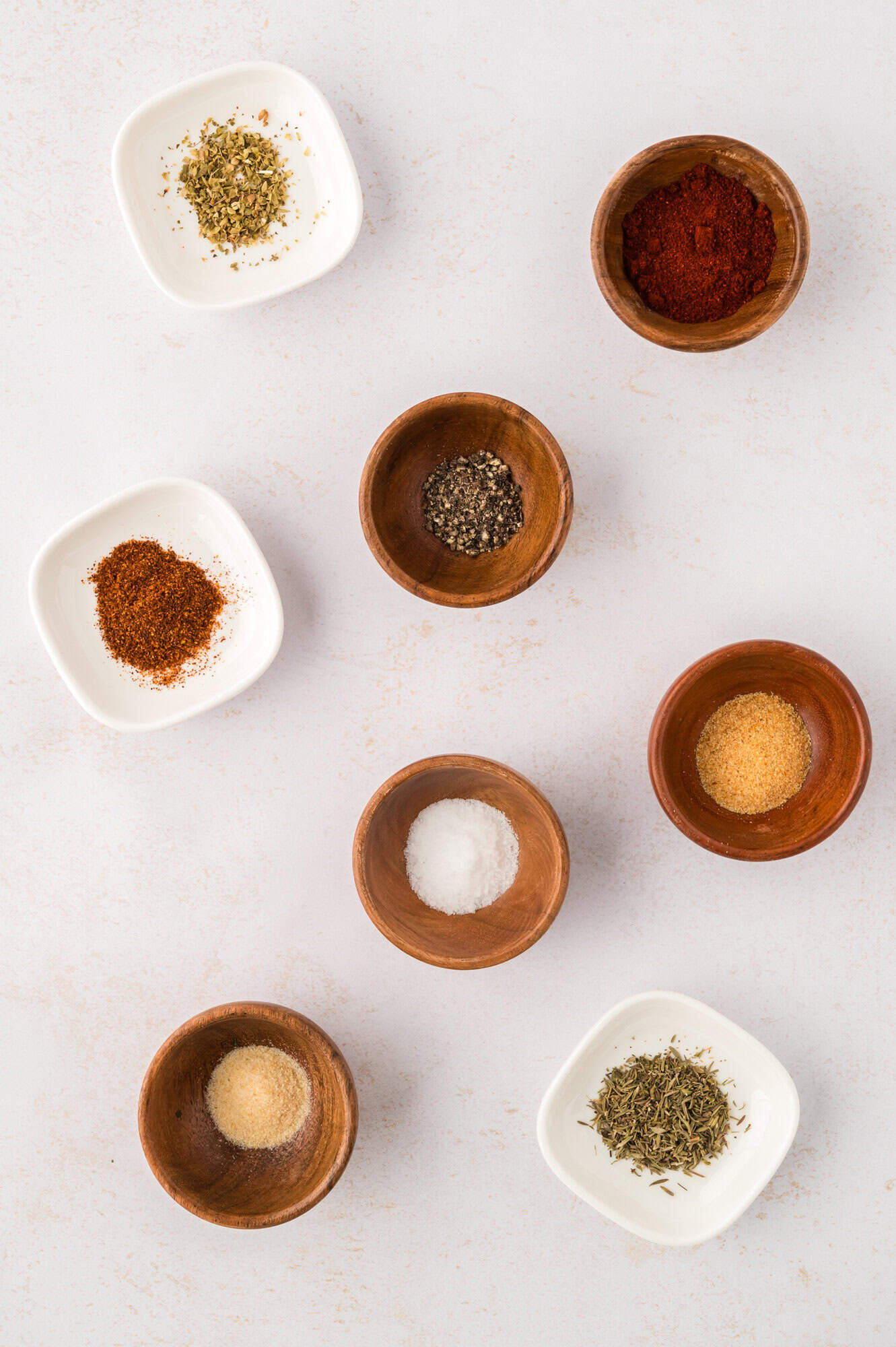Spices in separate bowls.
