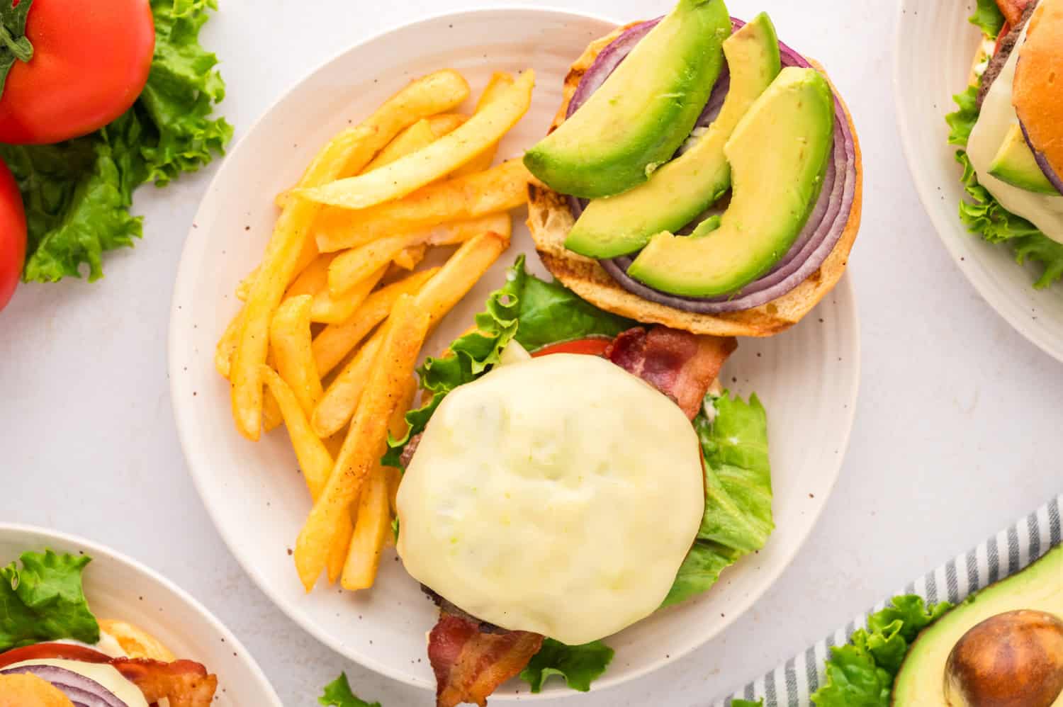Burger, open faced to show toppings.