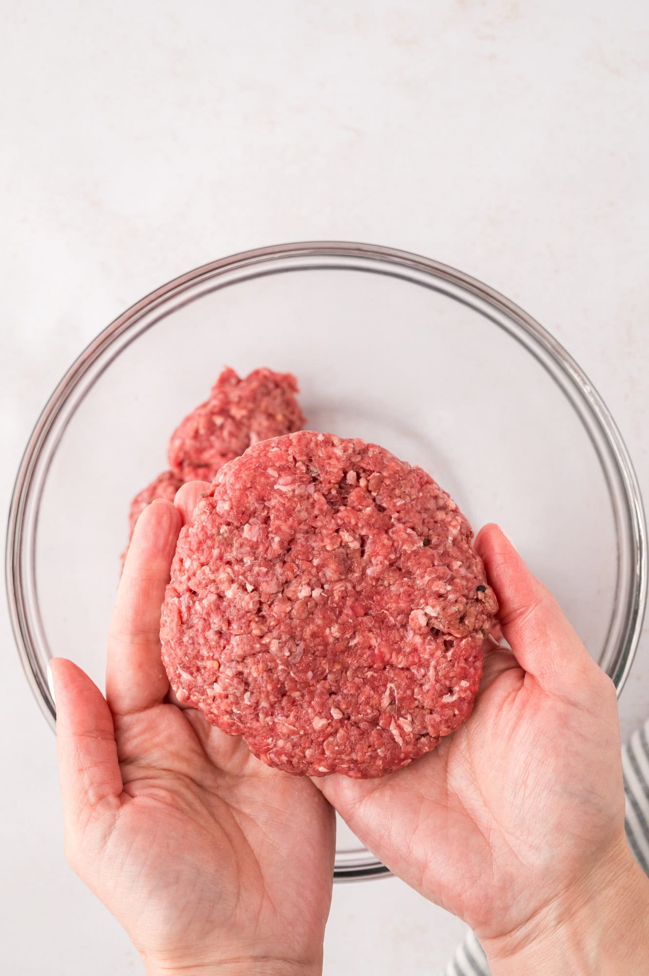 Ground beef formed into a patty.