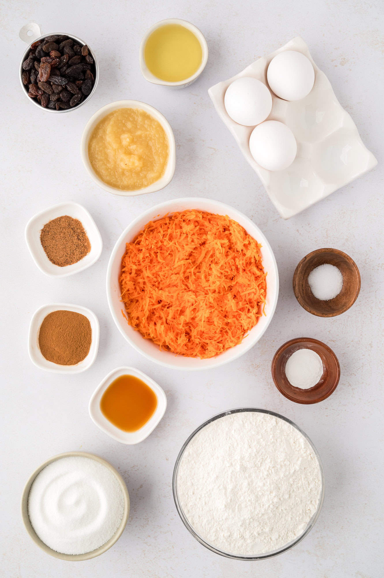 Overhead view of ingredients needed for carrot cake muffins.