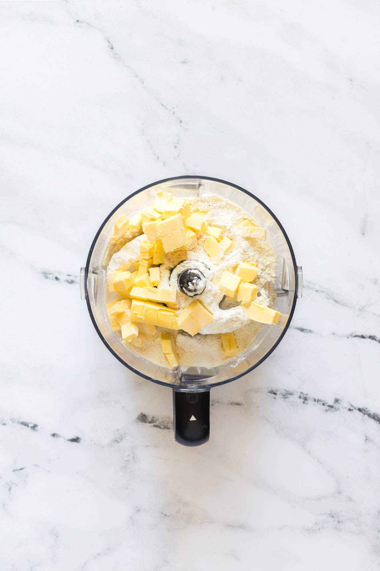 Ingredients for crust in food processor.