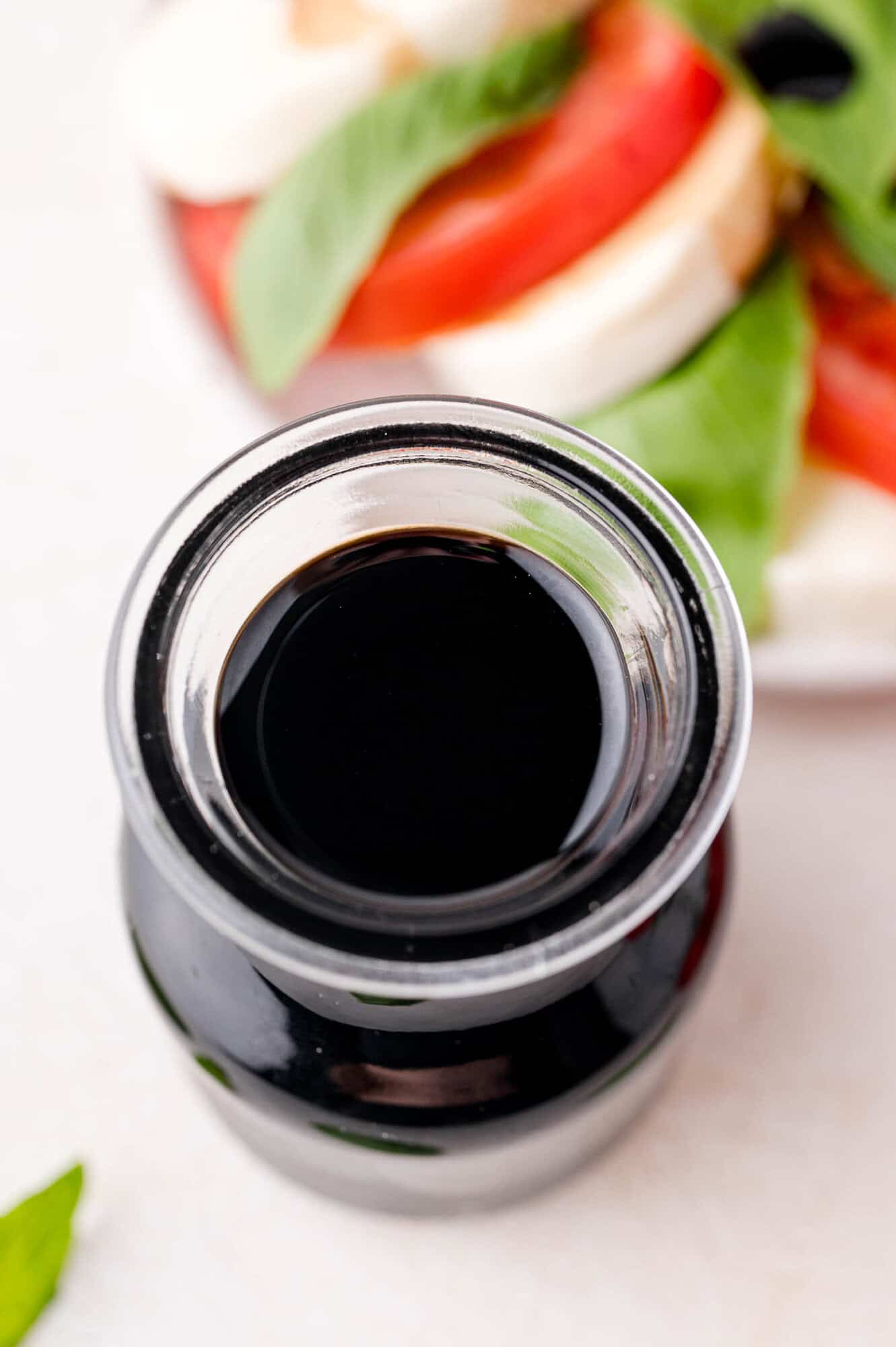 Balsamic glaze in a small jar.