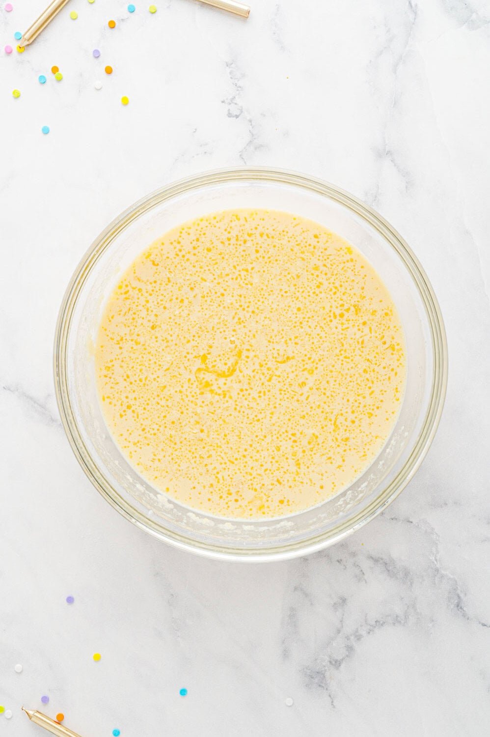 Wet ingredients in a mixing bowl.