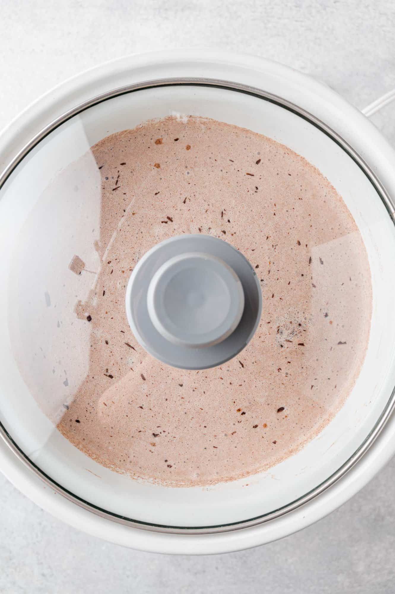 Crockpot covered, with hot chocolate inside.