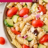 Greek Pasta Salad Pinterest graphic with text and photos.