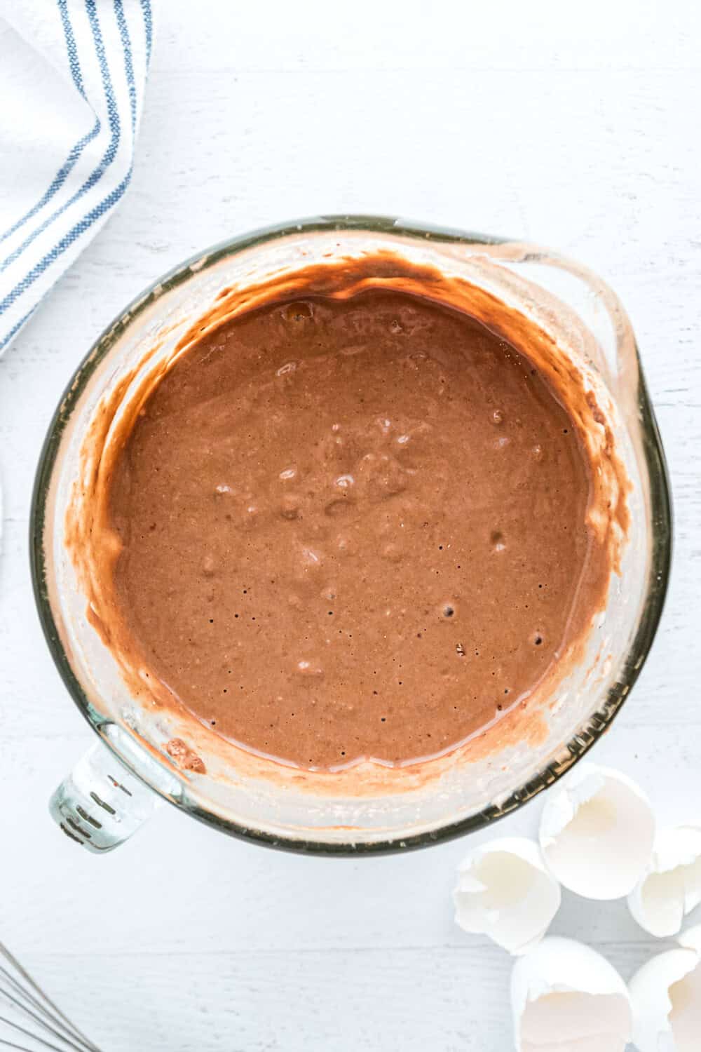 Chocolate pancake batter in a bowl.