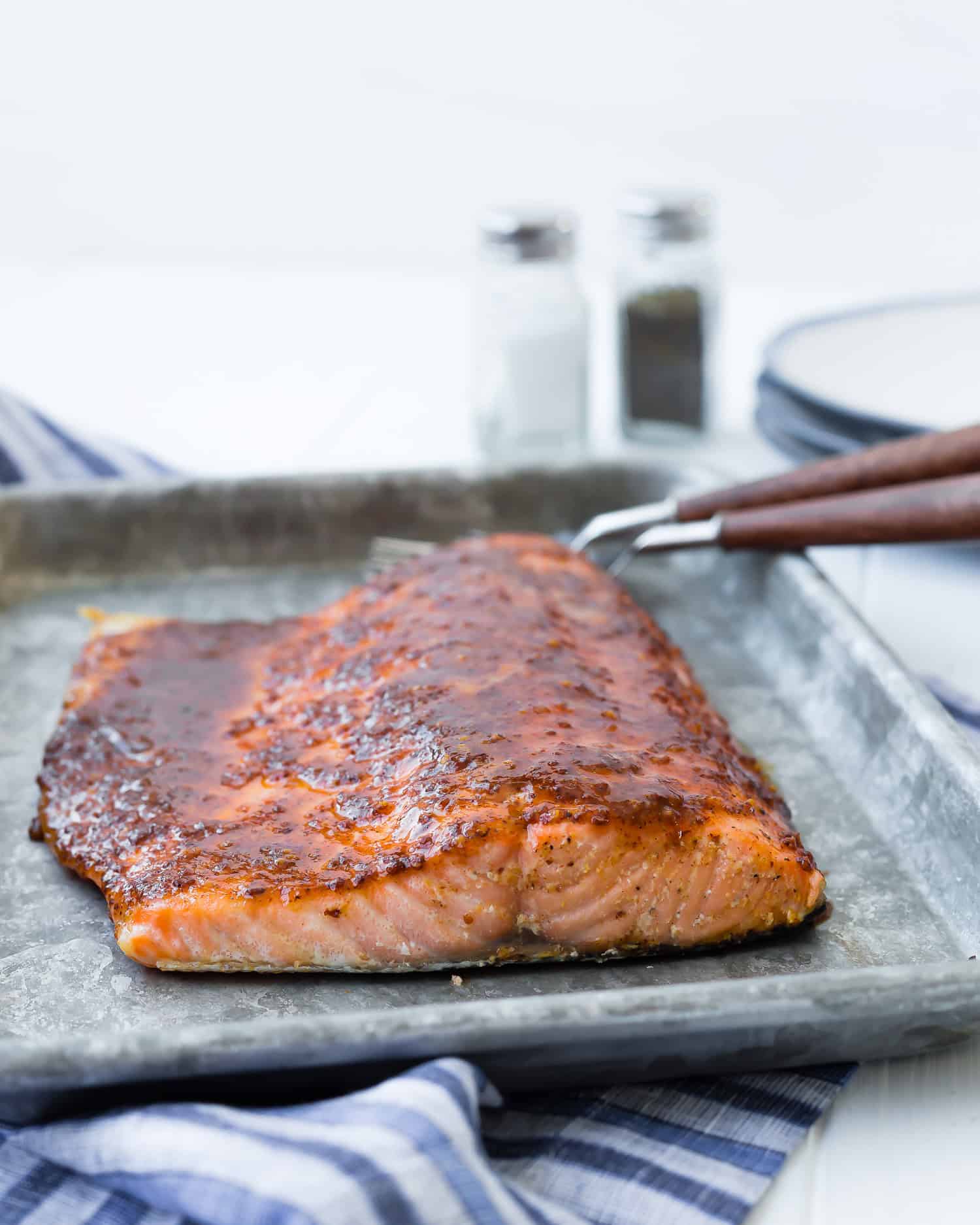 Baked salmon on a sheet pan.