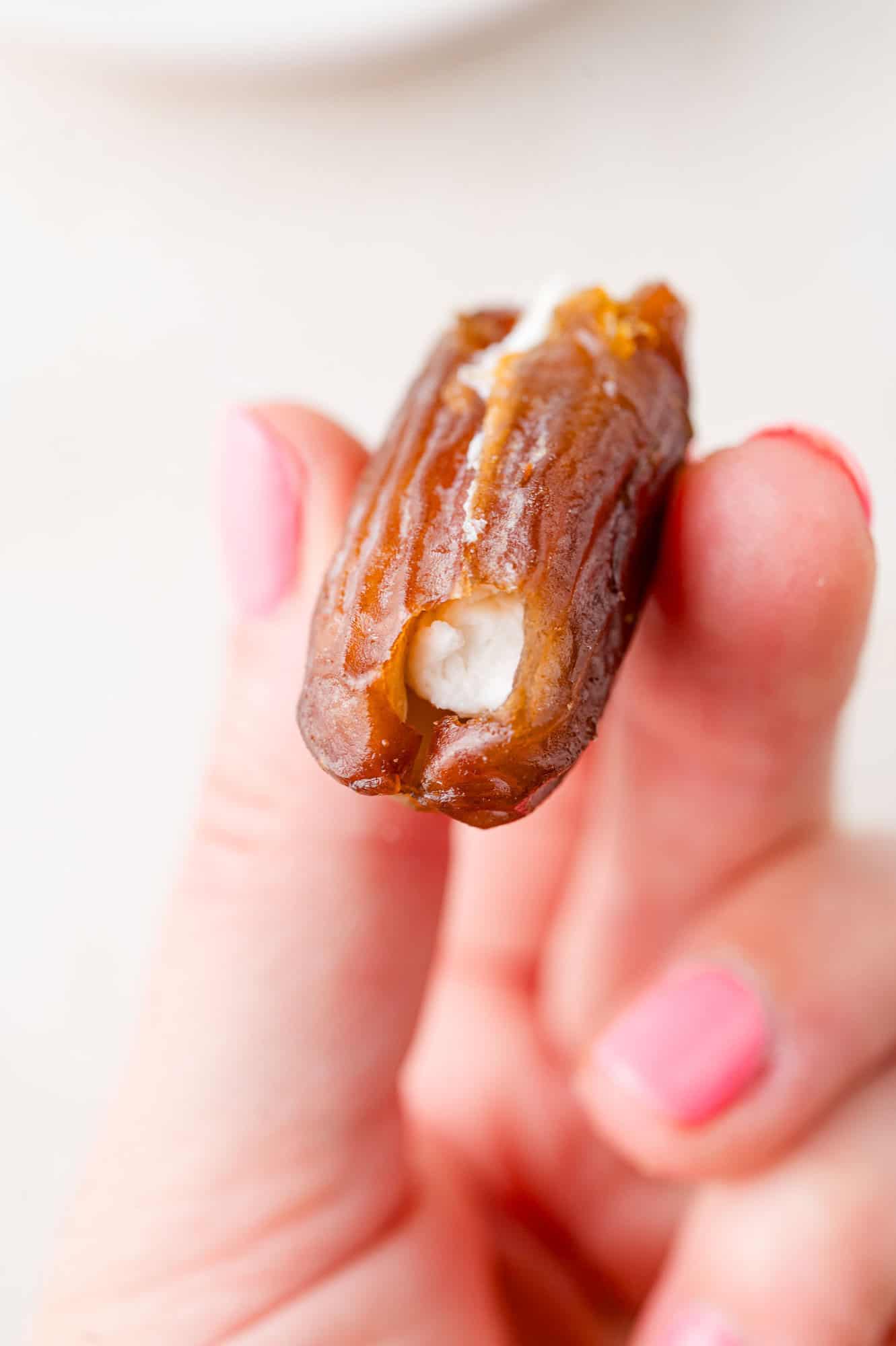 Large date stuffed with goat cheese.
