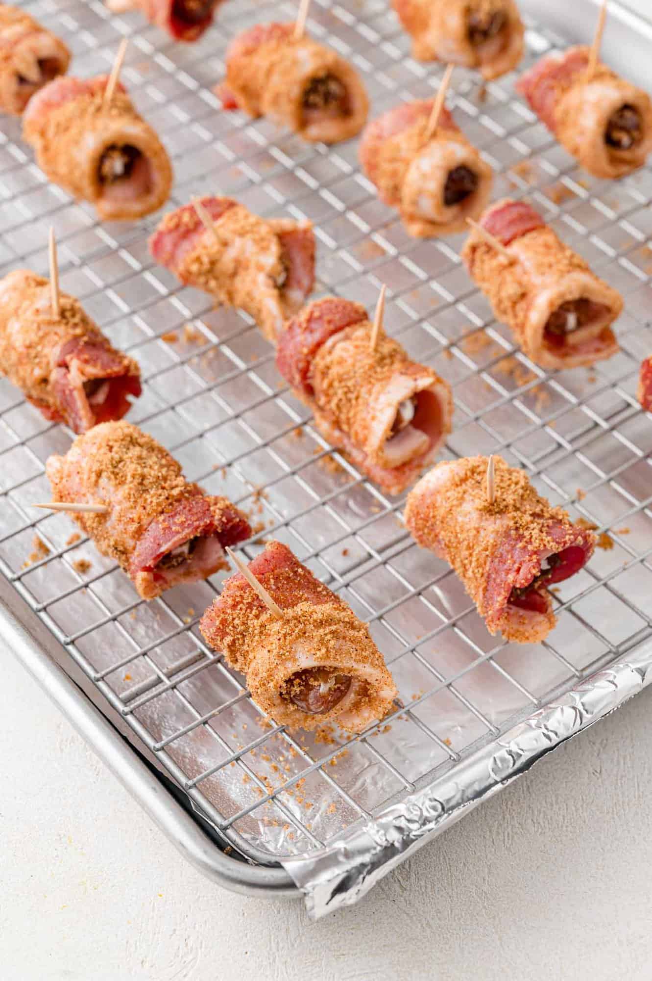 Dates, before baking, on prepared sheet pan.