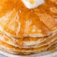 Buttermilk Pancakes Pinterest graphic with text and photos.