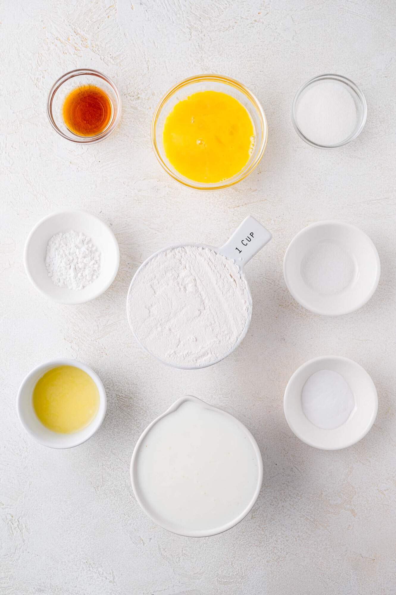 Overhead view of ingredients needed for buttermilk pancake recipe.