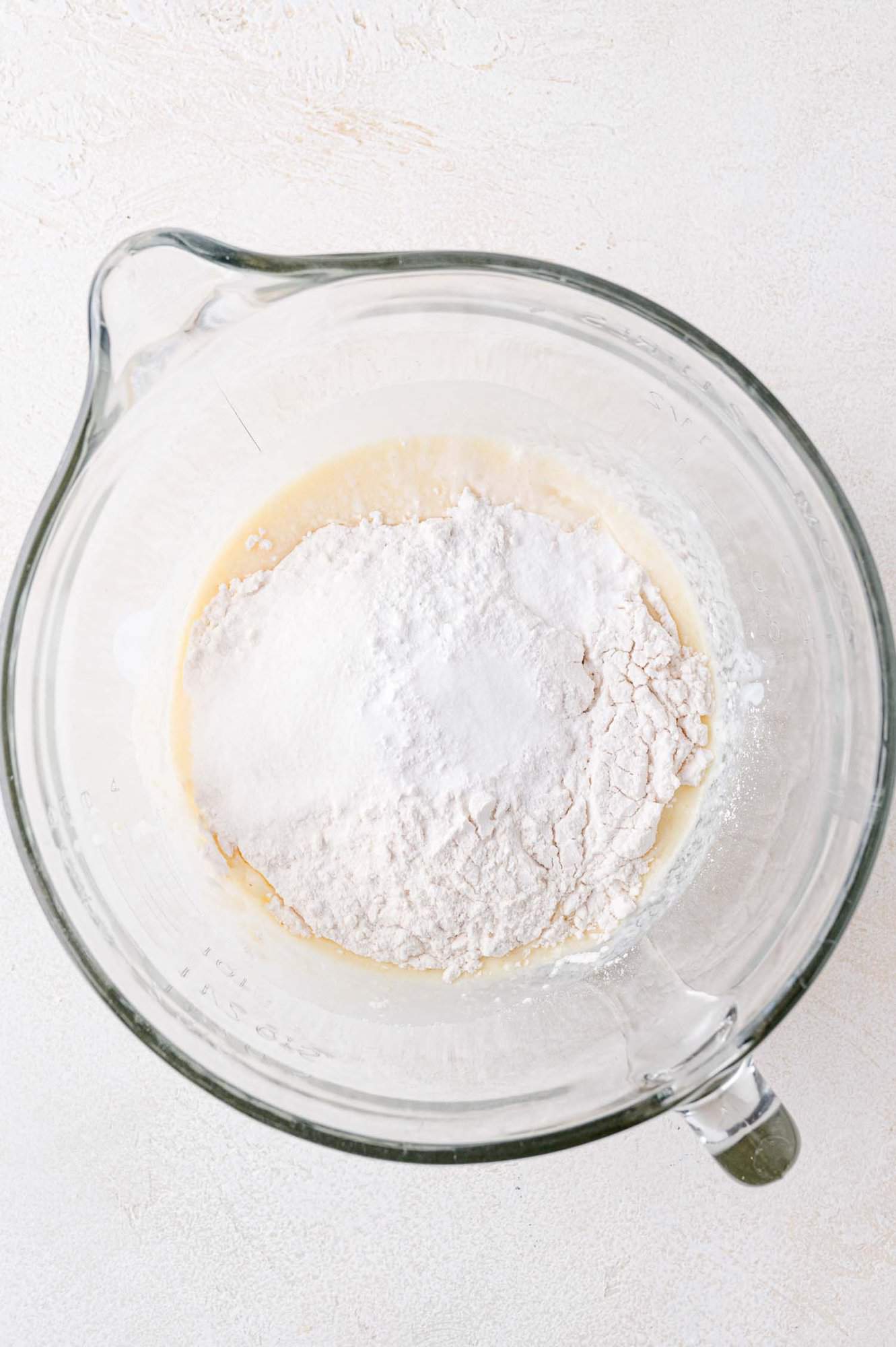 Dry ingredients, on top of wet ingredients.
