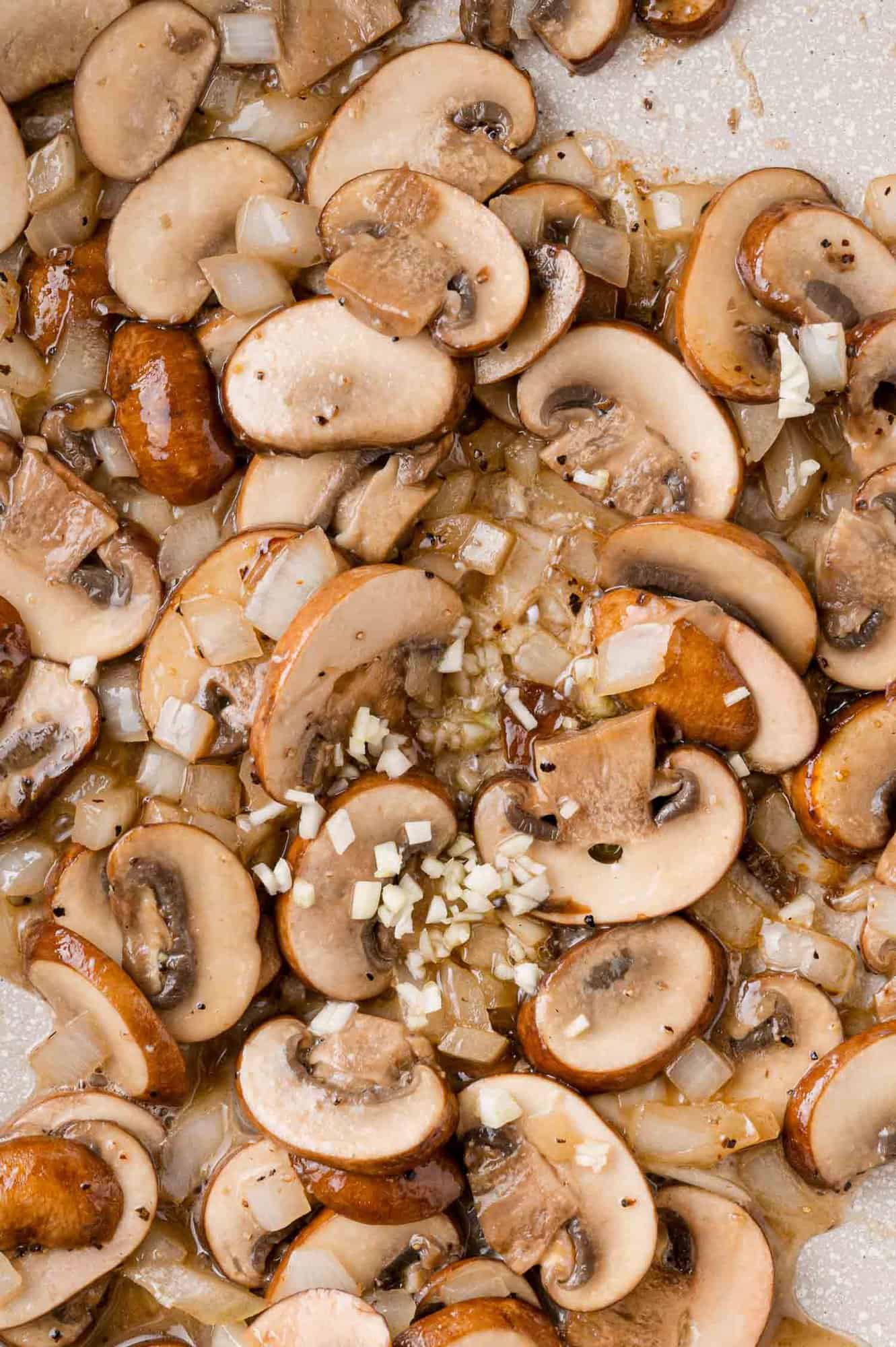 Garlic added to pan.