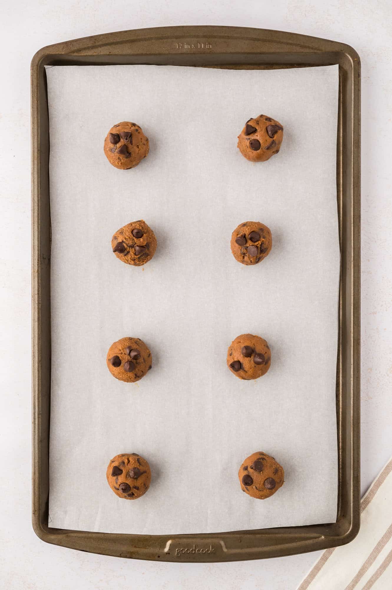 Cookie dough on cookie sheet, not yet baked.