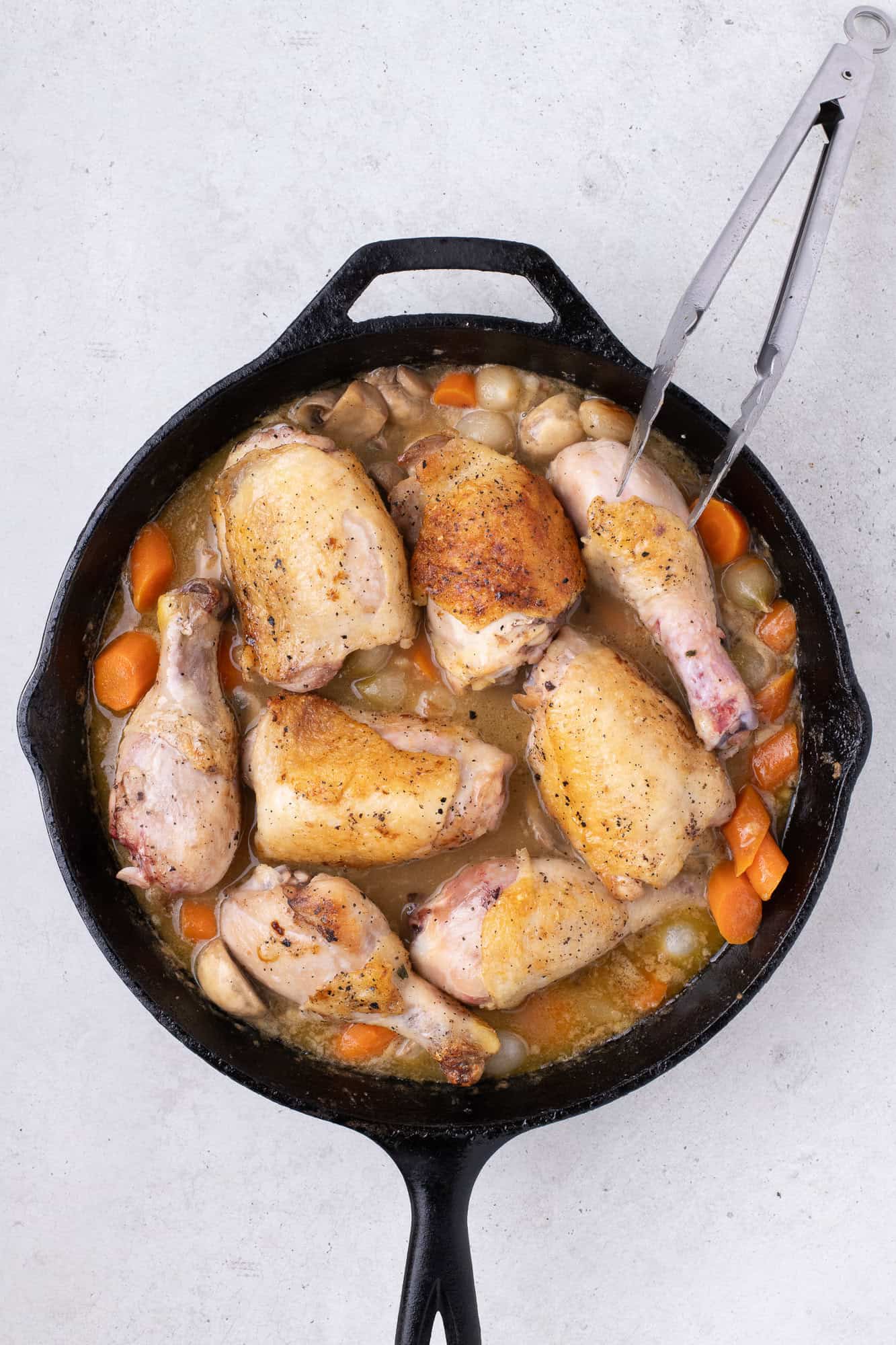Chicken nestled into sauce.