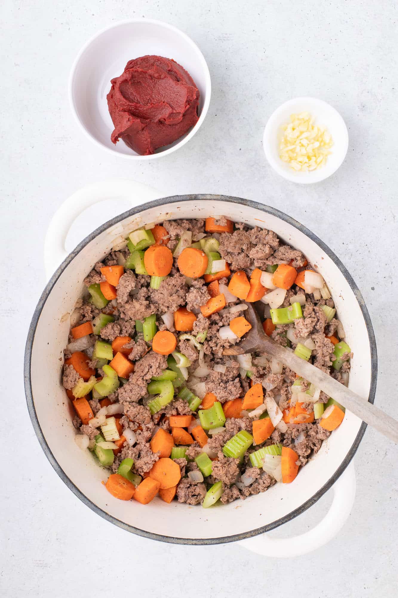 Vegetables added to beef.