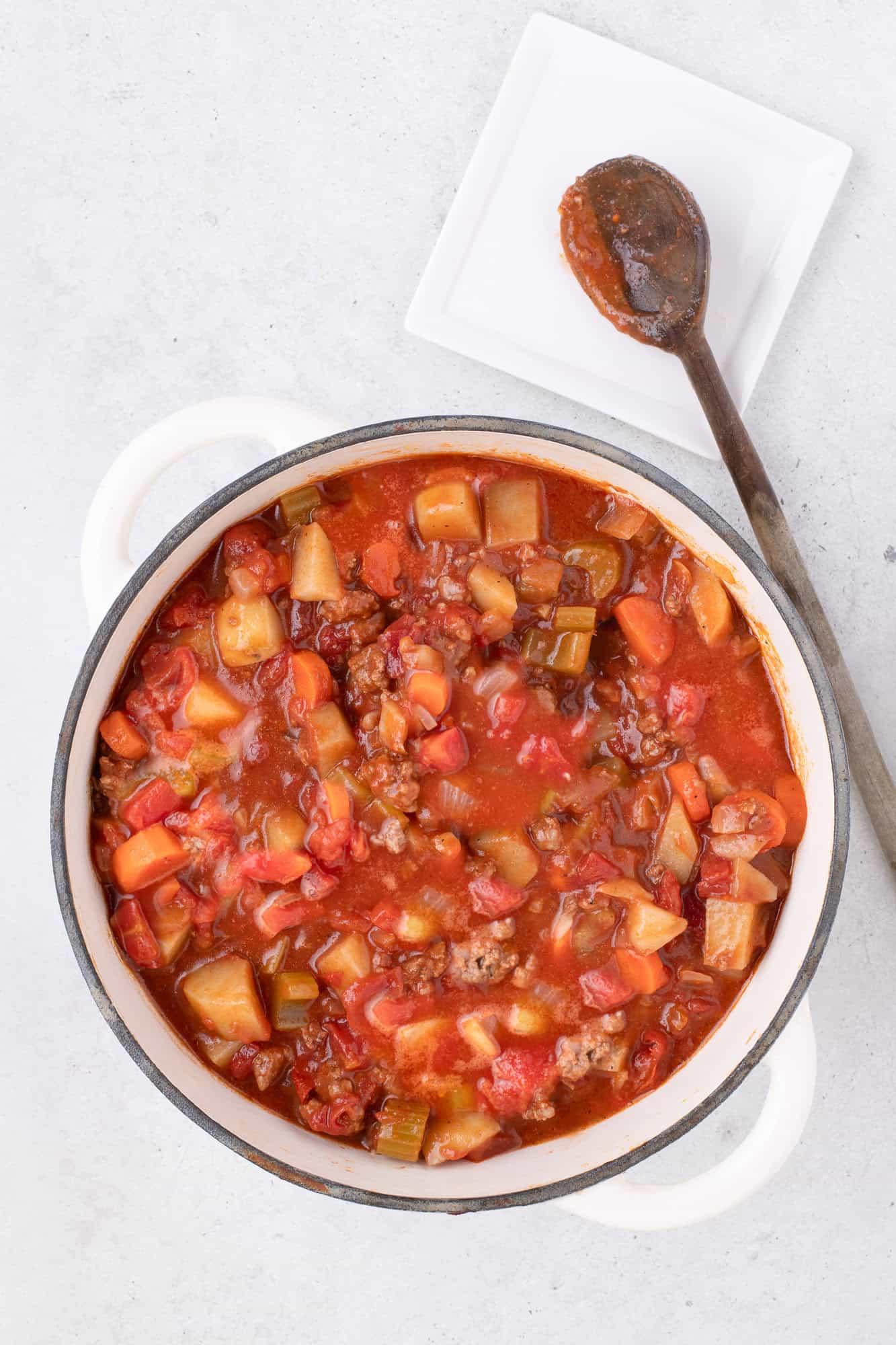 Soup, potatoes cooked, and ready to serve.