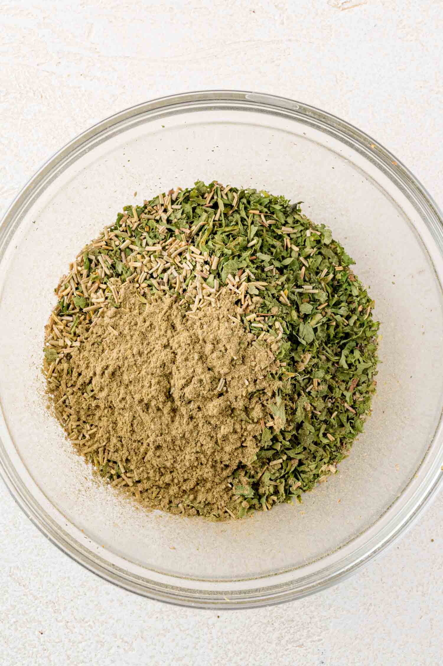 Ingredients all in one glass bowl, not yet mixed together.