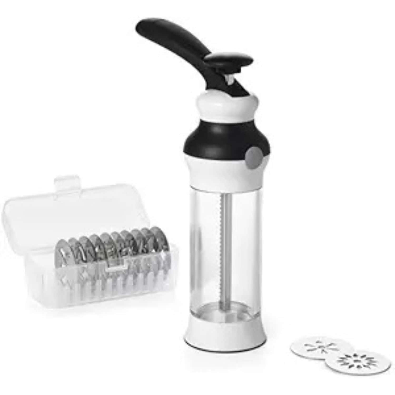 A cookie press with a clear tube, black handle, and a set of metal discs for shaping cookies.