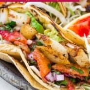 Fish Tacos Recipe Pinterest graphic with text and photos.