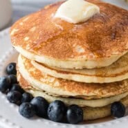 Lemon ricotta pancakes Pinterest graphic with text and photos.