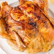 Air Fryer Whole Chicken Pinterest graphic with text and photos.