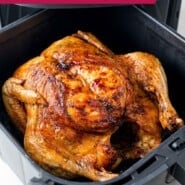 Air Fryer Whole Chicken Pinterest graphic with text and photos.