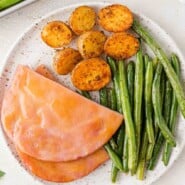 Ham steak sheet pan dinner Pinterest graphic with text and photos.