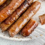 How to Cook Breakfast Sausage Links Pinterest graphic with text and photos.